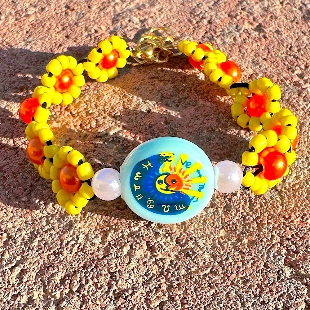 Yellow and Orange Floral Beaded Sun and Moon Bracelet with Gold Colored Accents